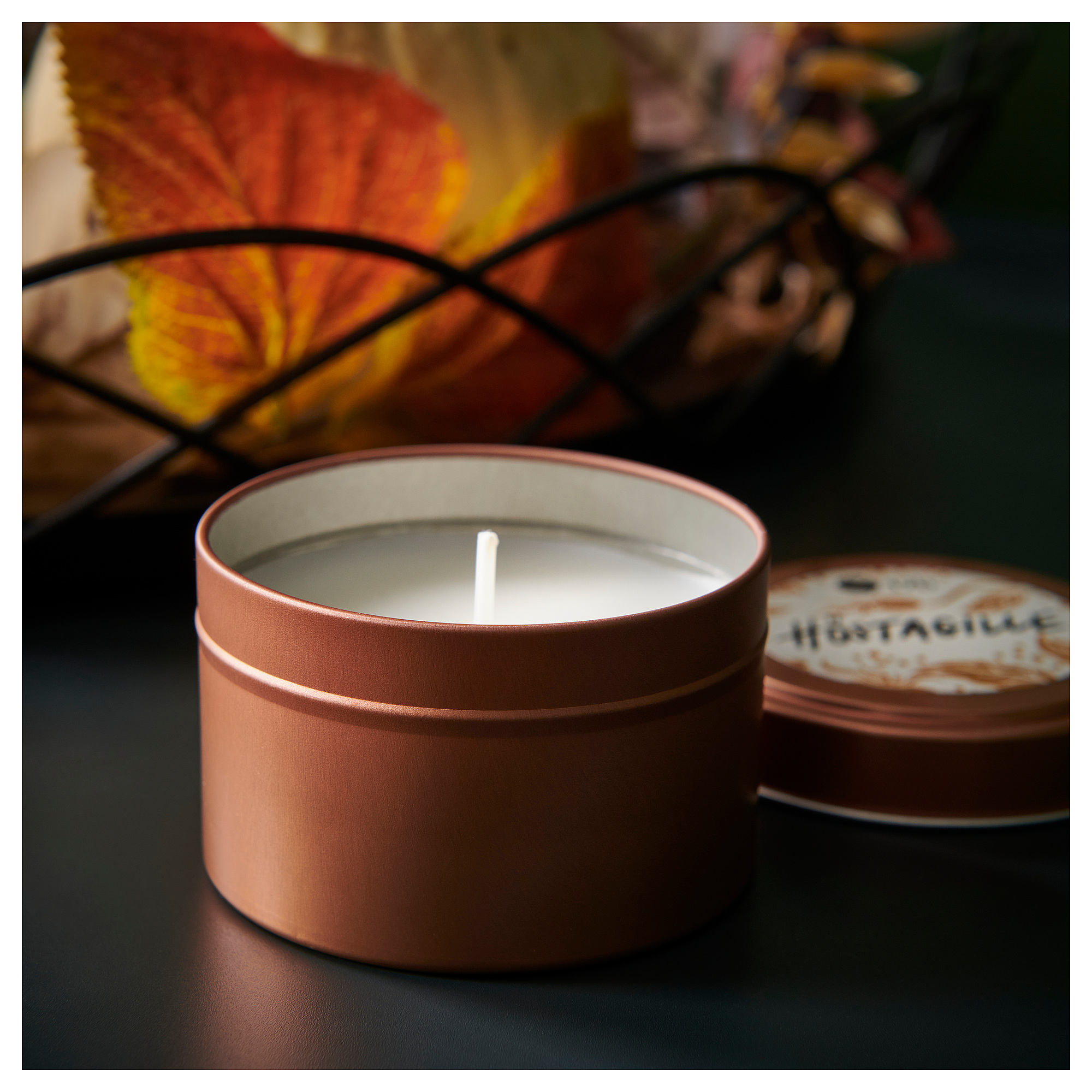 HÖSTAGILLE scented candle in metal tin